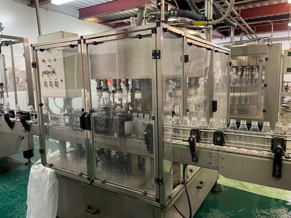 Second Hand Bottle Filling Line with Capacity 2,200 BHR Used Lines